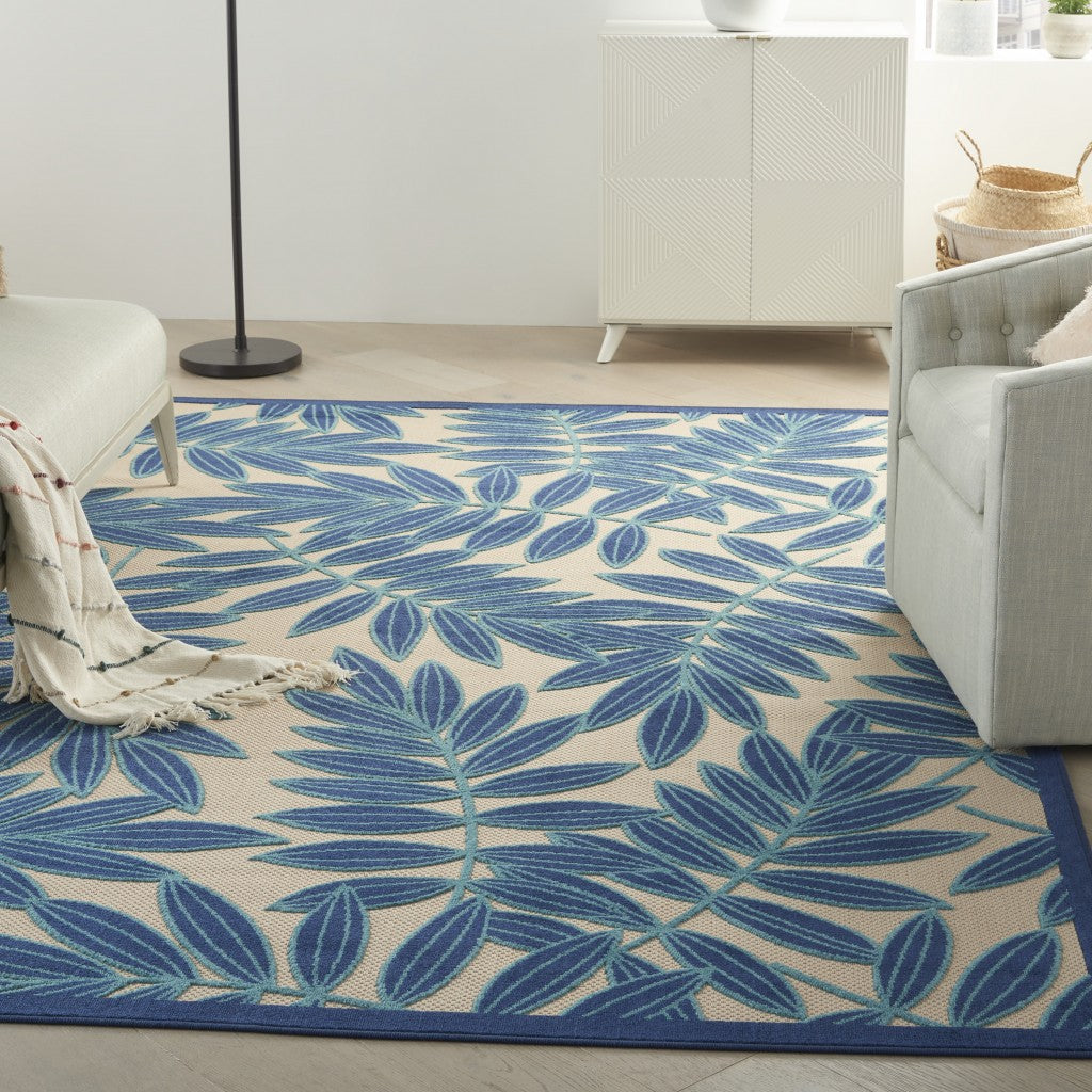 7’ x 10’ Navy and Beige Leaves Indoor Outdoor Area Rug